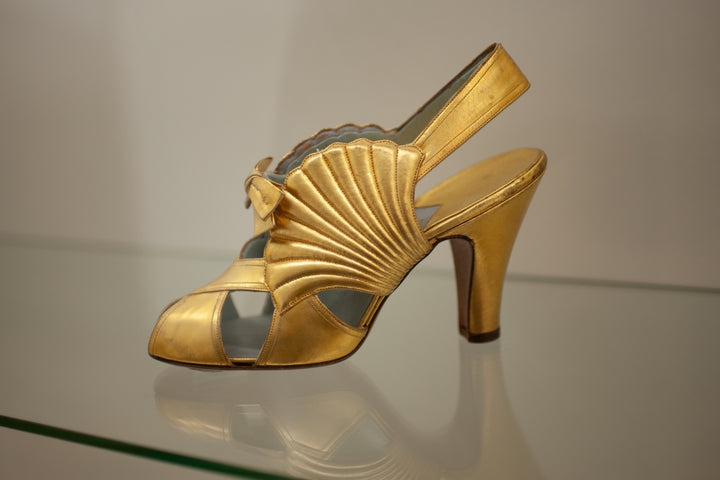 Course: 1939 Gold Shell Shoes